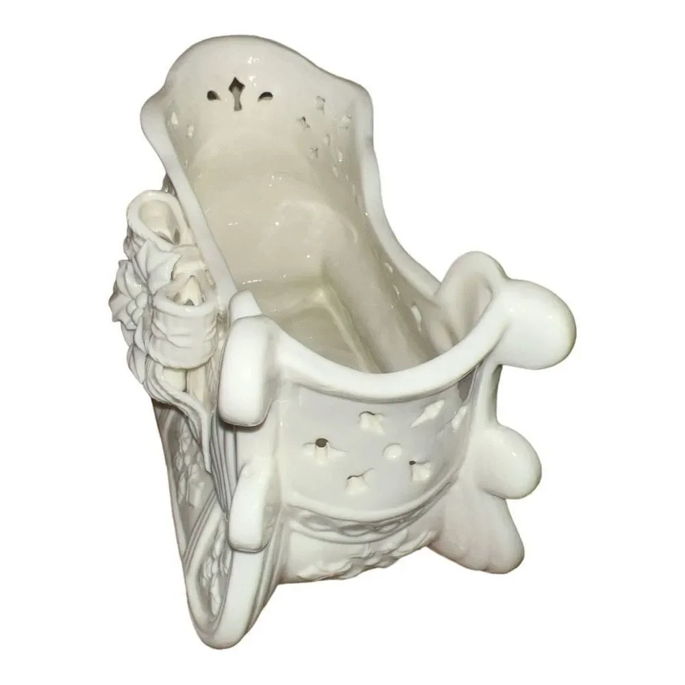 Ceramic sleigh candy dish, basket with Holly bow and snowflakes